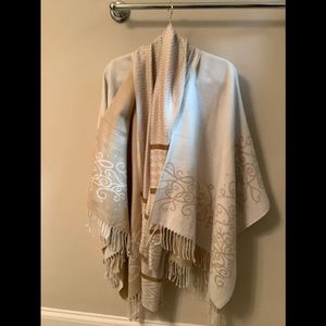 Wonderful reverse able Poncho in Cream & tan with free scarf.  One size